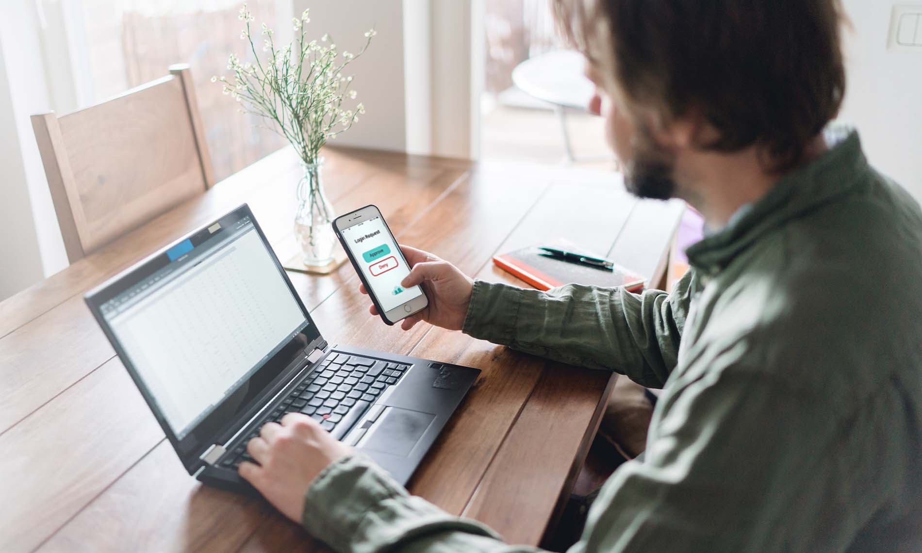 guy on computer and laptop